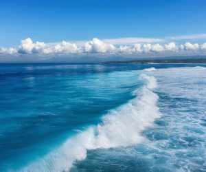Waves and azure water as a background. View from high rock at the ocean surface. Natural summer seascape. Water background. Indonesia - photo